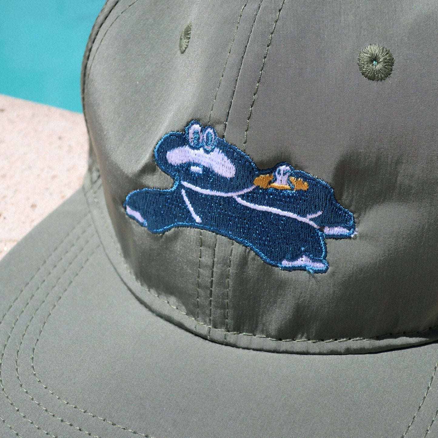 Dinosaur Onsen Cap - Water Resistant Smokey Green