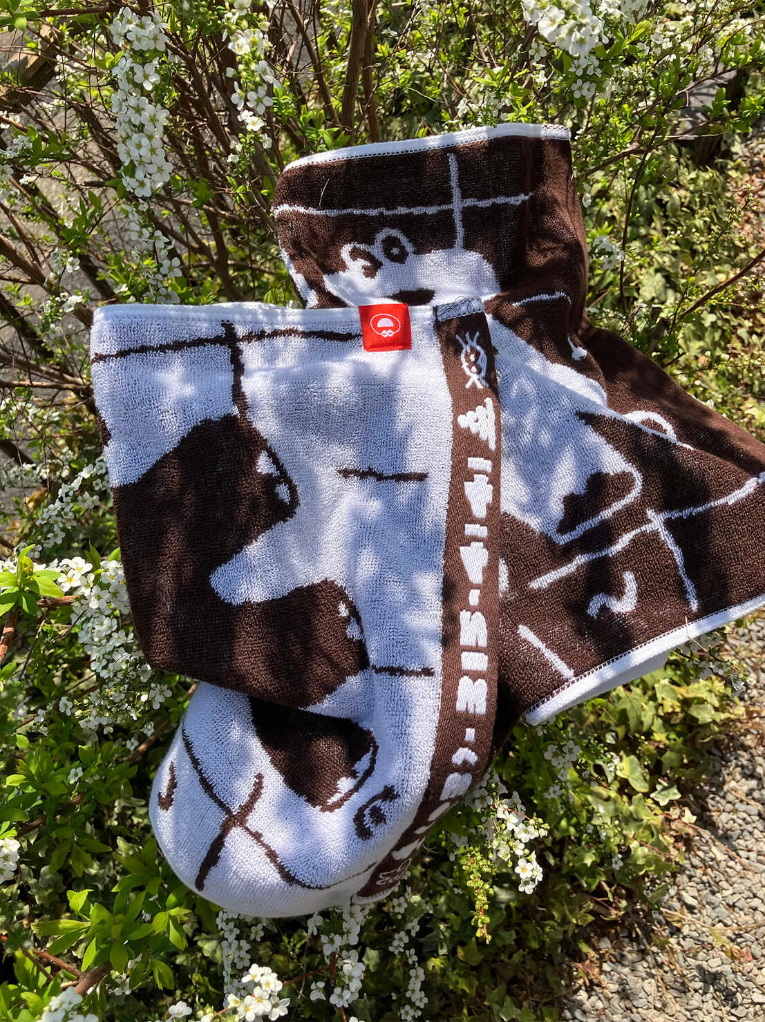 Dinosaur Onsen Hand Towel Brown