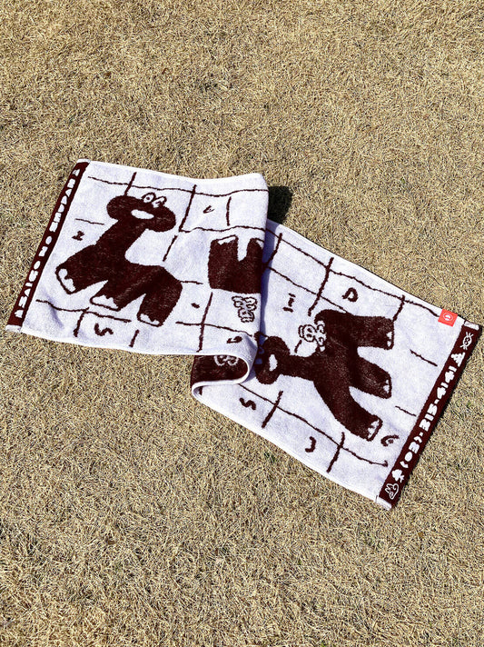 Dinosaur Onsen Hand Towel Brown